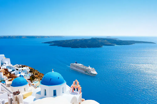 A Norwegian Cruise Line ship sailing among the Greek Islands